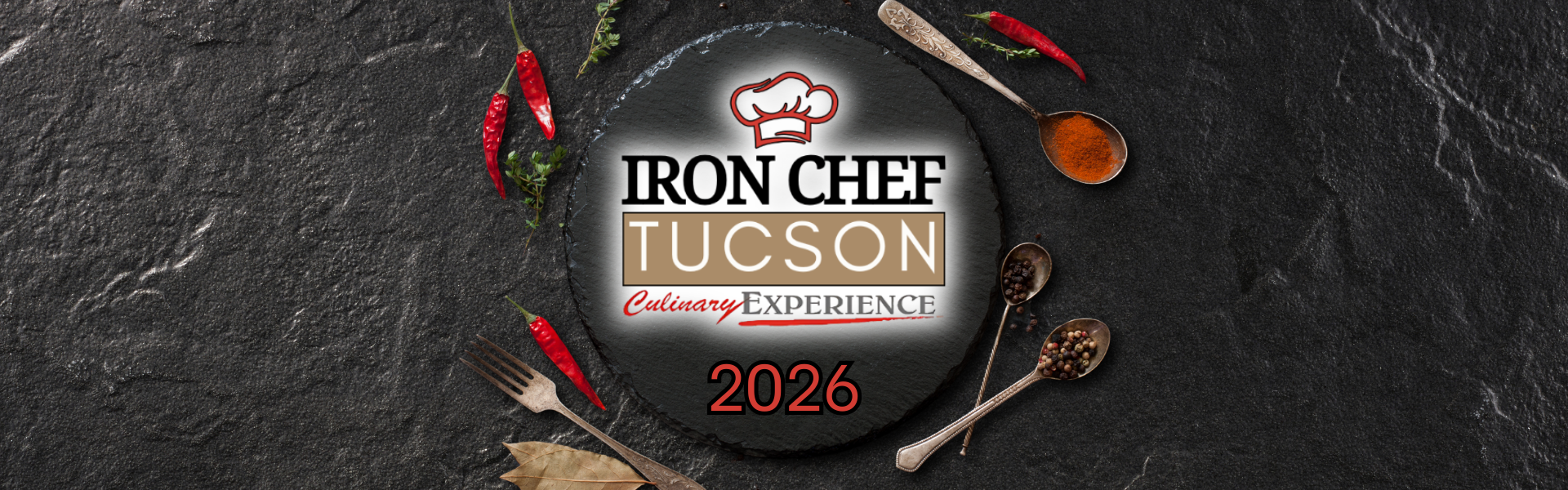 Iron Chef Tucson Culinary Experience 2026 logo centered on a dark stone background, surrounded by red chili peppers, herbs, spices, and rustic utensils, promoting the annual Tucson food and chef competition.